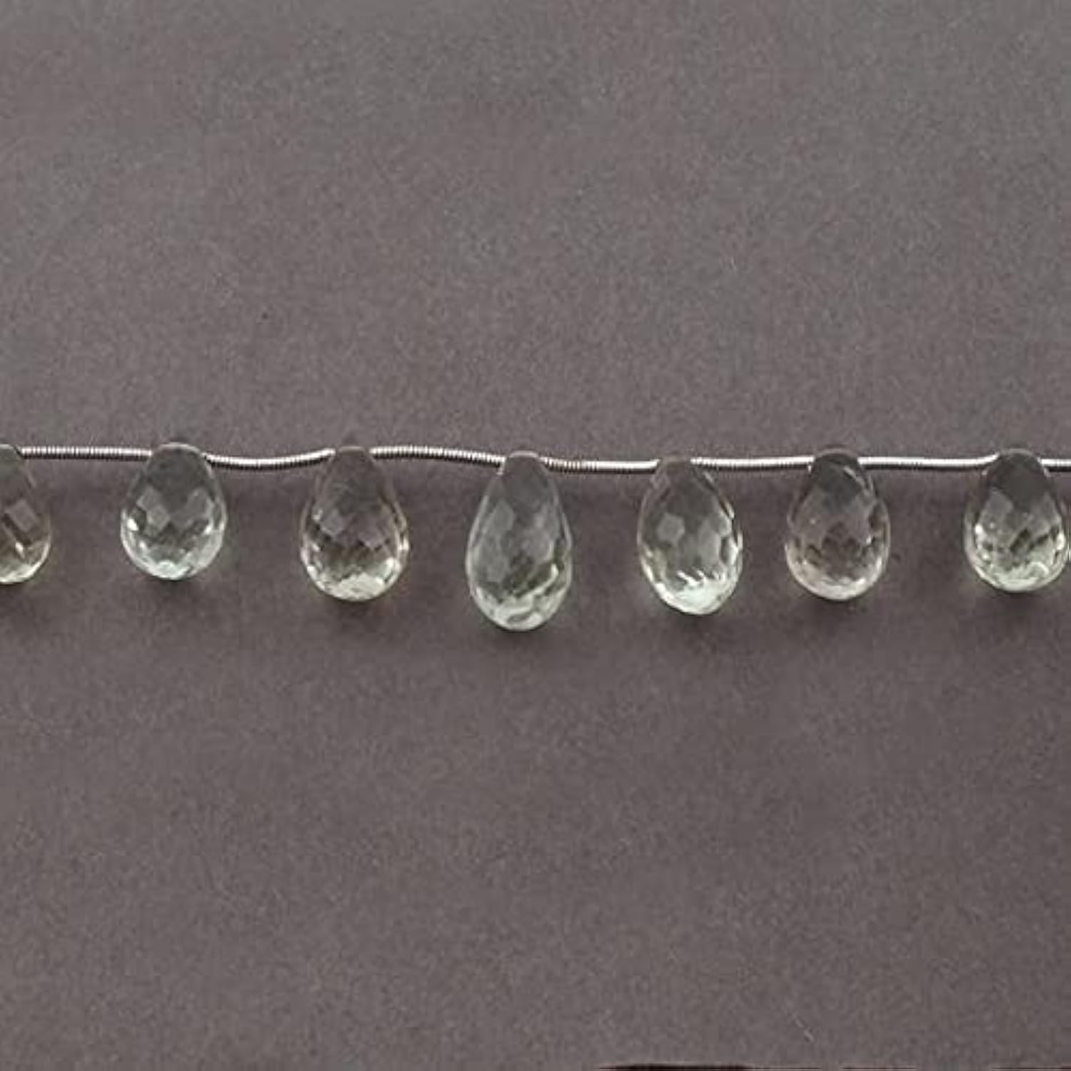 Gouttes d'améthyste verte facettées pour créer des bijoux artisanaux sur mesure