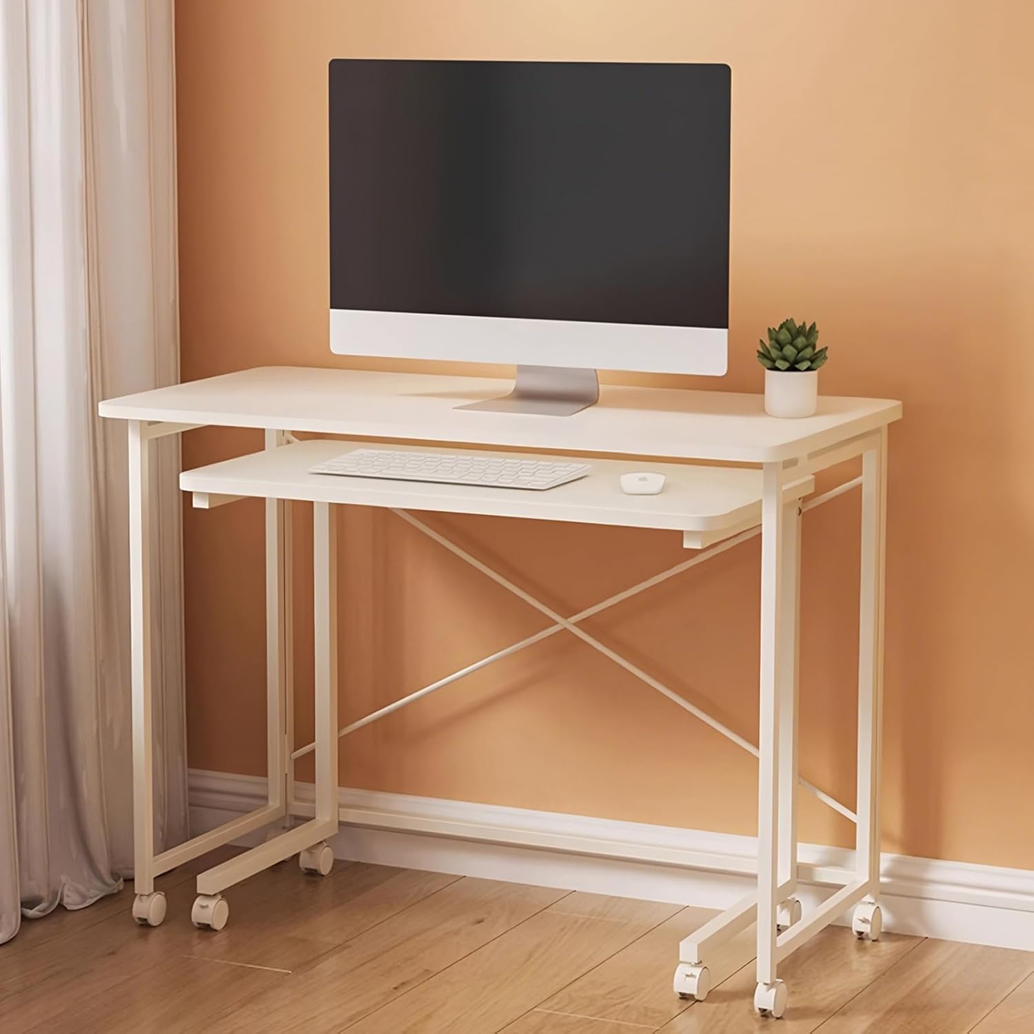 unico（ウニコ）のKURT（クルト）バタフライテーブル。オーク材の