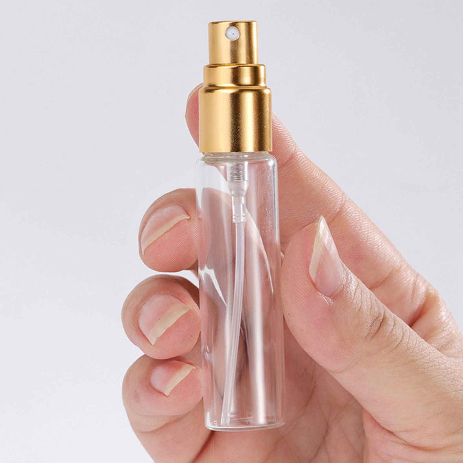 Flaconi spray portatili per profumi, in vetro, da 10 ml, per viaggi, 50 pezzi, erogatori di nebbia fine, mini formato per profumi, oli essenziali, in uscita (oro)