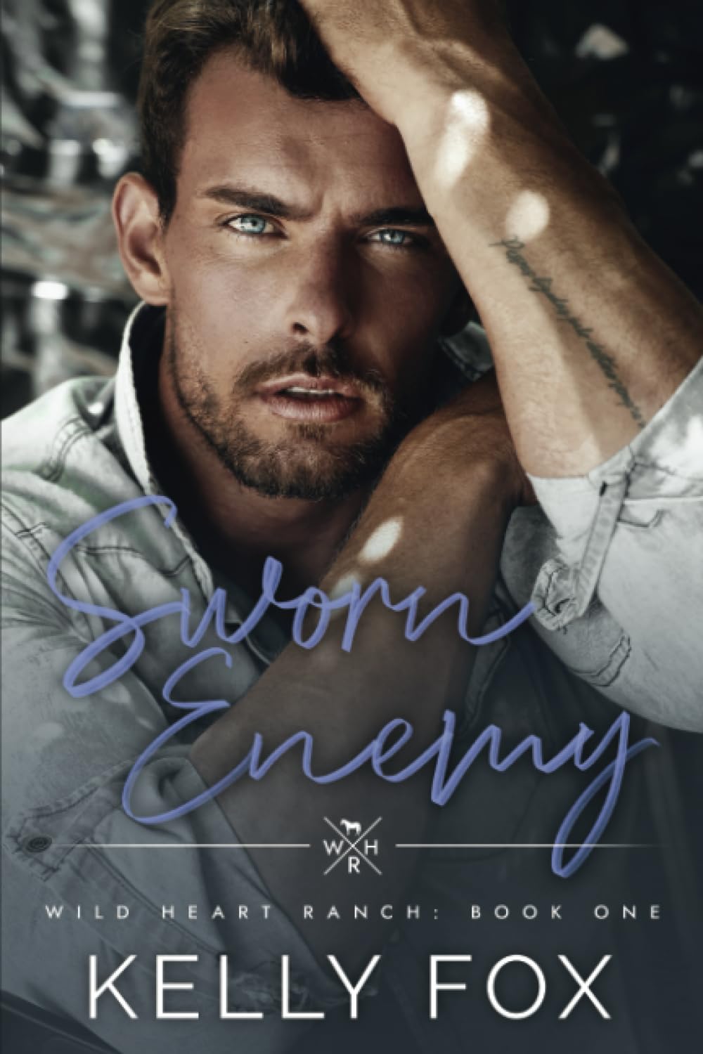 Sworn Enemy: An MM Enemies-To-Lovers Book (Wild Heart Ranch)