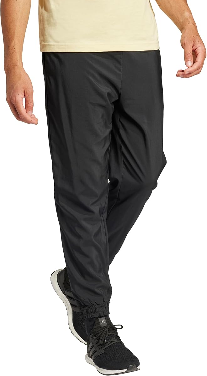 adidas Essentials - Pantalones elásticos con logo pequeño para hombre