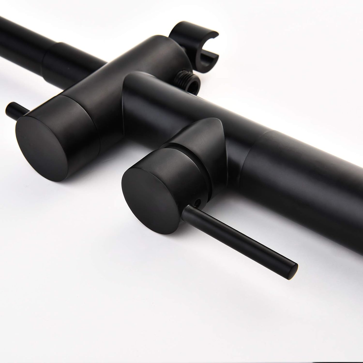 Close-up of the faucet's mixer handle and diverter knob.