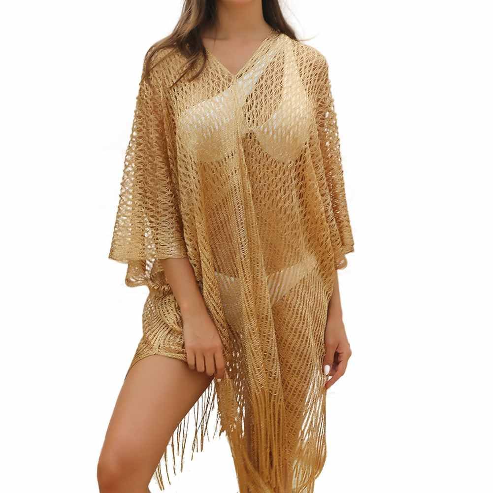 Poncho de plage avec pompons protection solaire pour femme élégante sous le soleil d'été