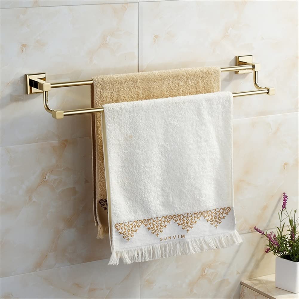 Support serviette en cuivre pour une salle de bain moderne et ordonnée