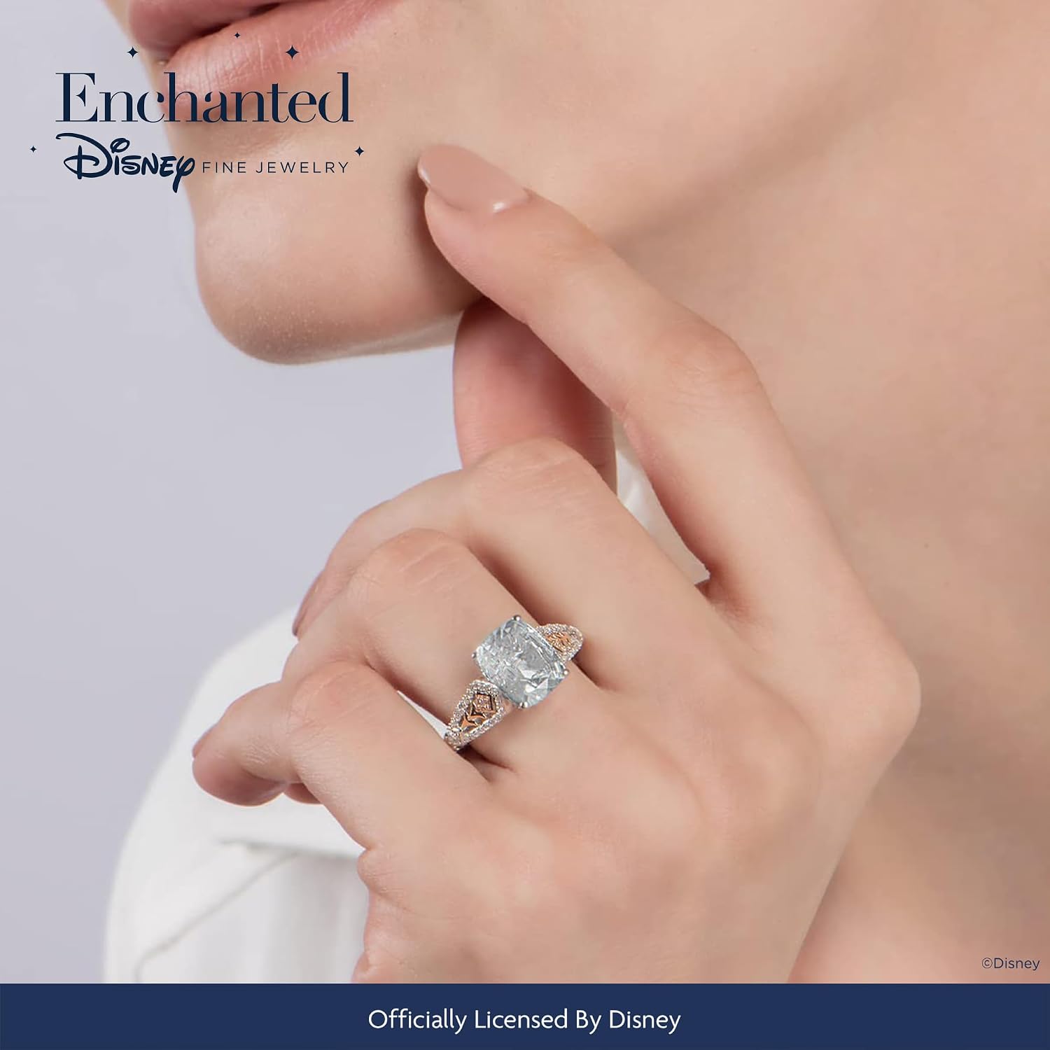 Jewelili Enchanted Disney Fine Jewelry Sterling Silver and 10K Rose Gold with 1/6 CTTW Diamond with Aquamarine Elsa Engagement Ring
