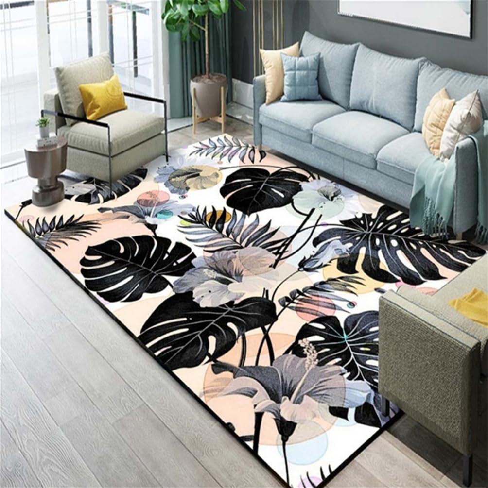 Tapis grande taille salon 160x210 cm avec motif feuilles de plantes bleues sur fond noir élégant