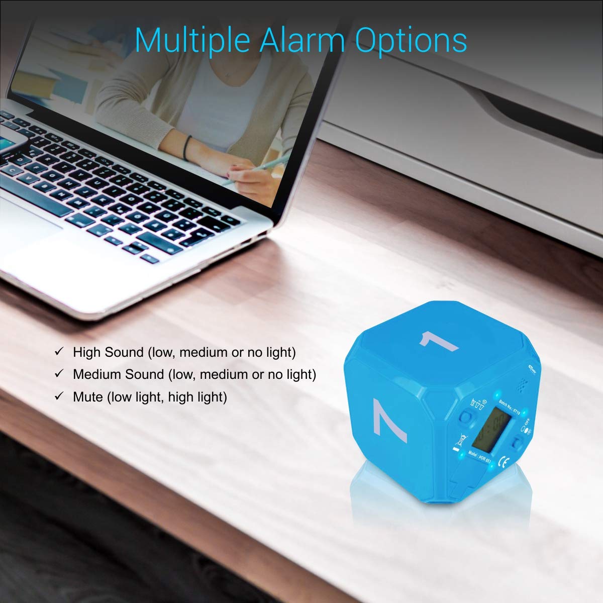 Image showing the Portronics Timeout timer cube with a laptop in the background, illustrating alarm options