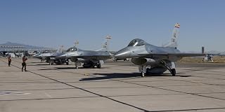 Posterazzi F-16's from the 162nd Fighter Wing line up at the end of the runway for preflight checks at the Tucson International Airport Arizona Poster Print, (20 x 10)