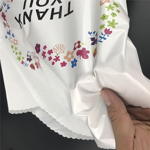 Miniatura 4 de SES.CO, bolsa de compras de plástico con manija y leyenda "Thank you" y borde floral. Contiene advertencia de sofocación. Color blanco beige (100