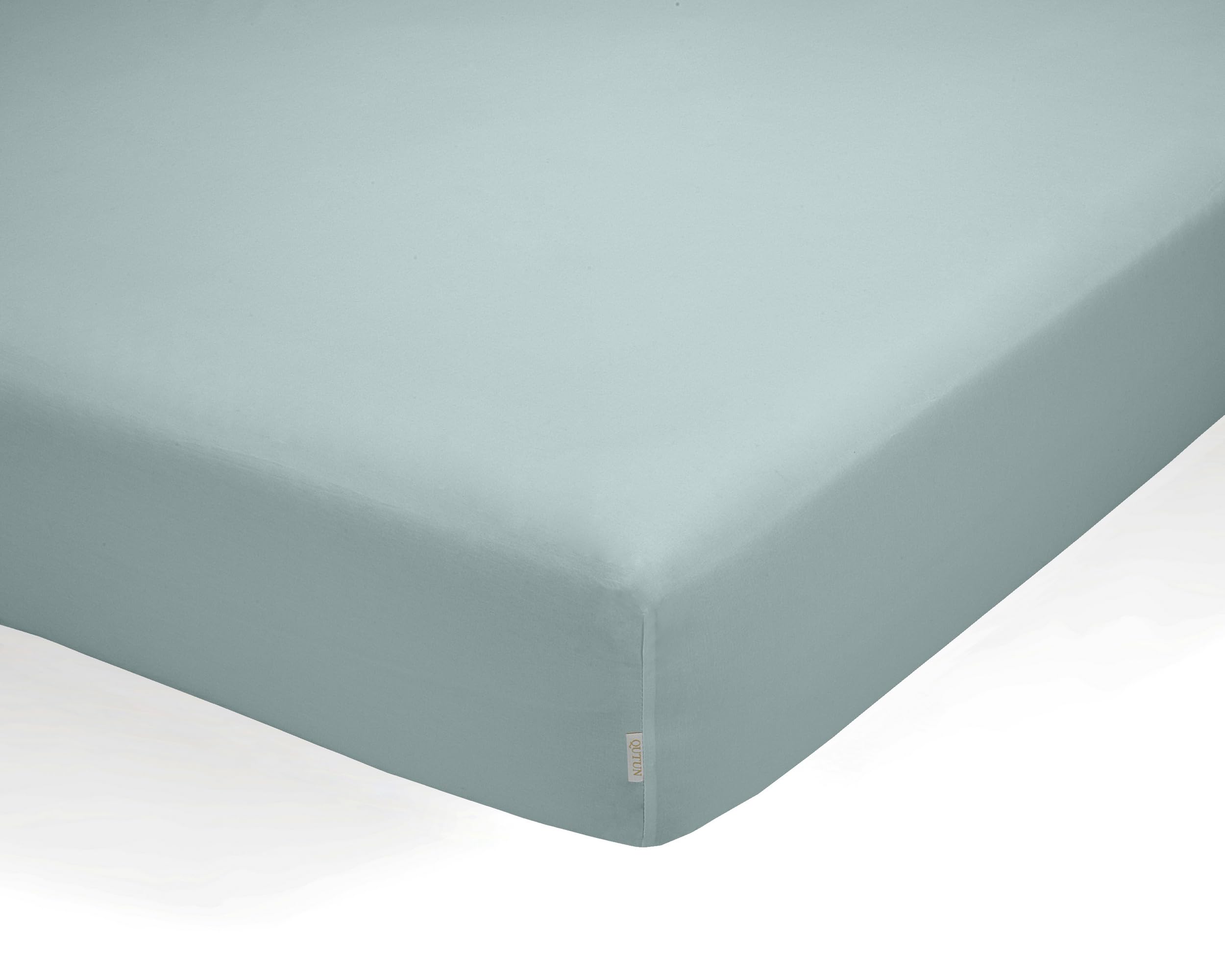 Sábana bajera ajustable de algodón orgánico color hielo. Cama de 90 cm.