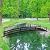 MOTION 10 FT Metal Garden Bridge, Long Garden Bridges for Outdoors, Outdoor Bridge with Circular Safety Guardrails, Iron Decorative Footbridge for Pond, Yard, Creek, Stream, Black