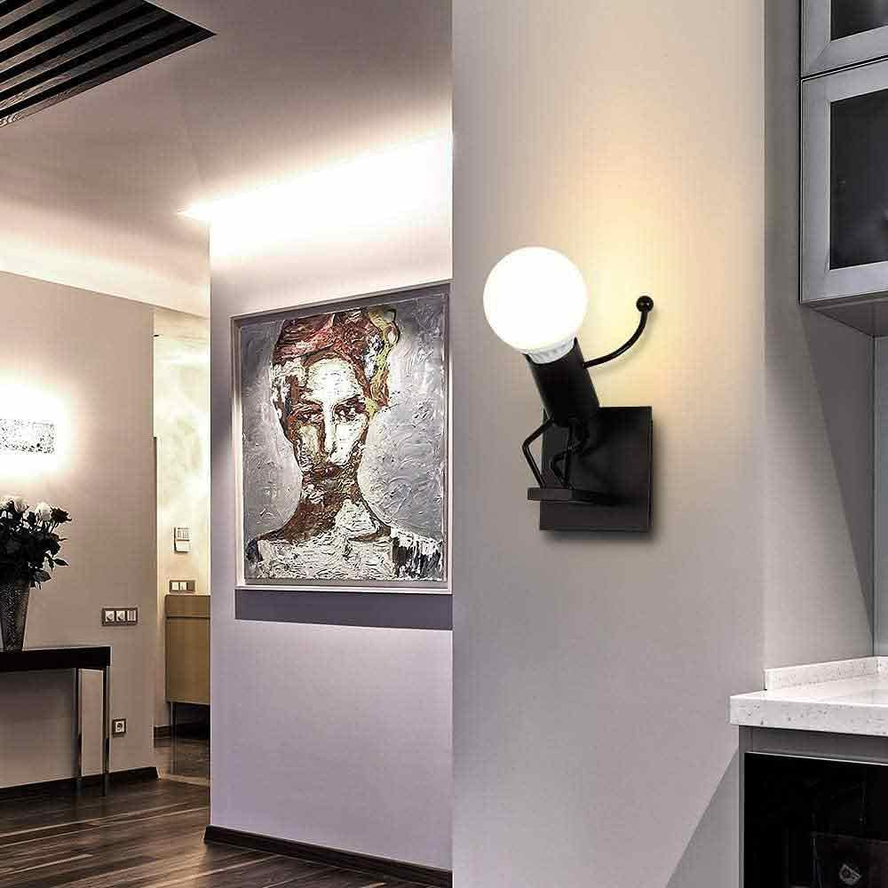 Vetrineinrete® Applique da parete decorativo a forma di omino lampada da muro in metallo attacco E27 arredo casa soggiorno ingresso(Omino che Salta Nero)