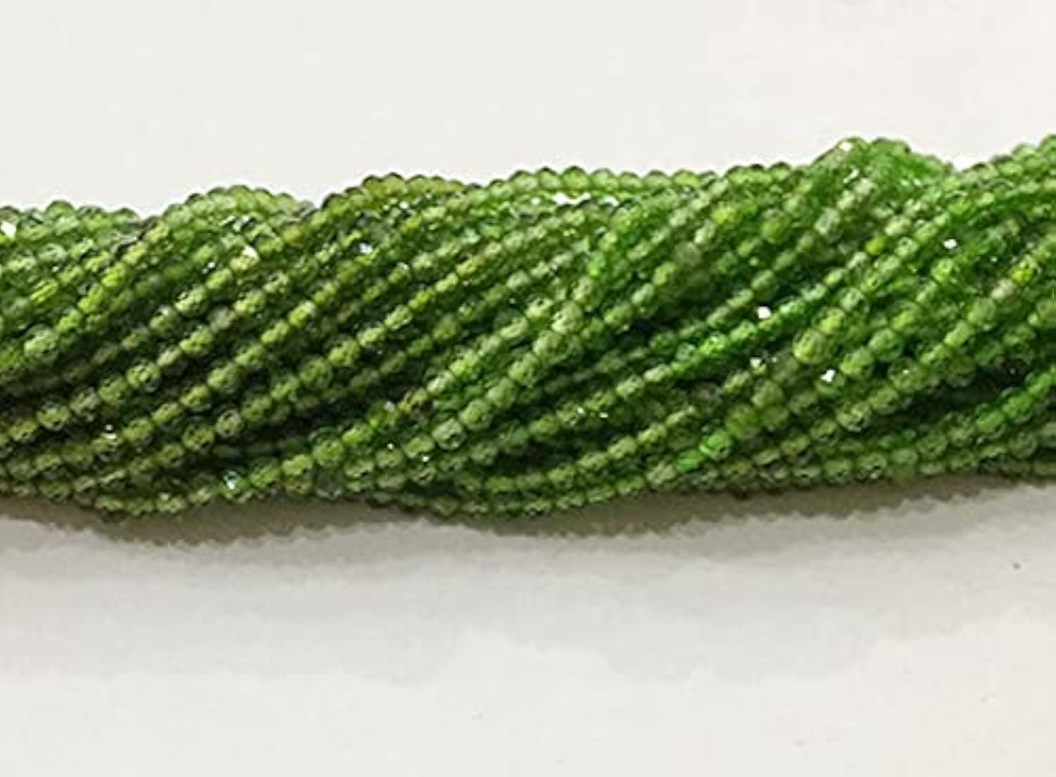 Perles Chrome Diopside AAA 2.5mm de qualité gemme pour la haute joaillerie