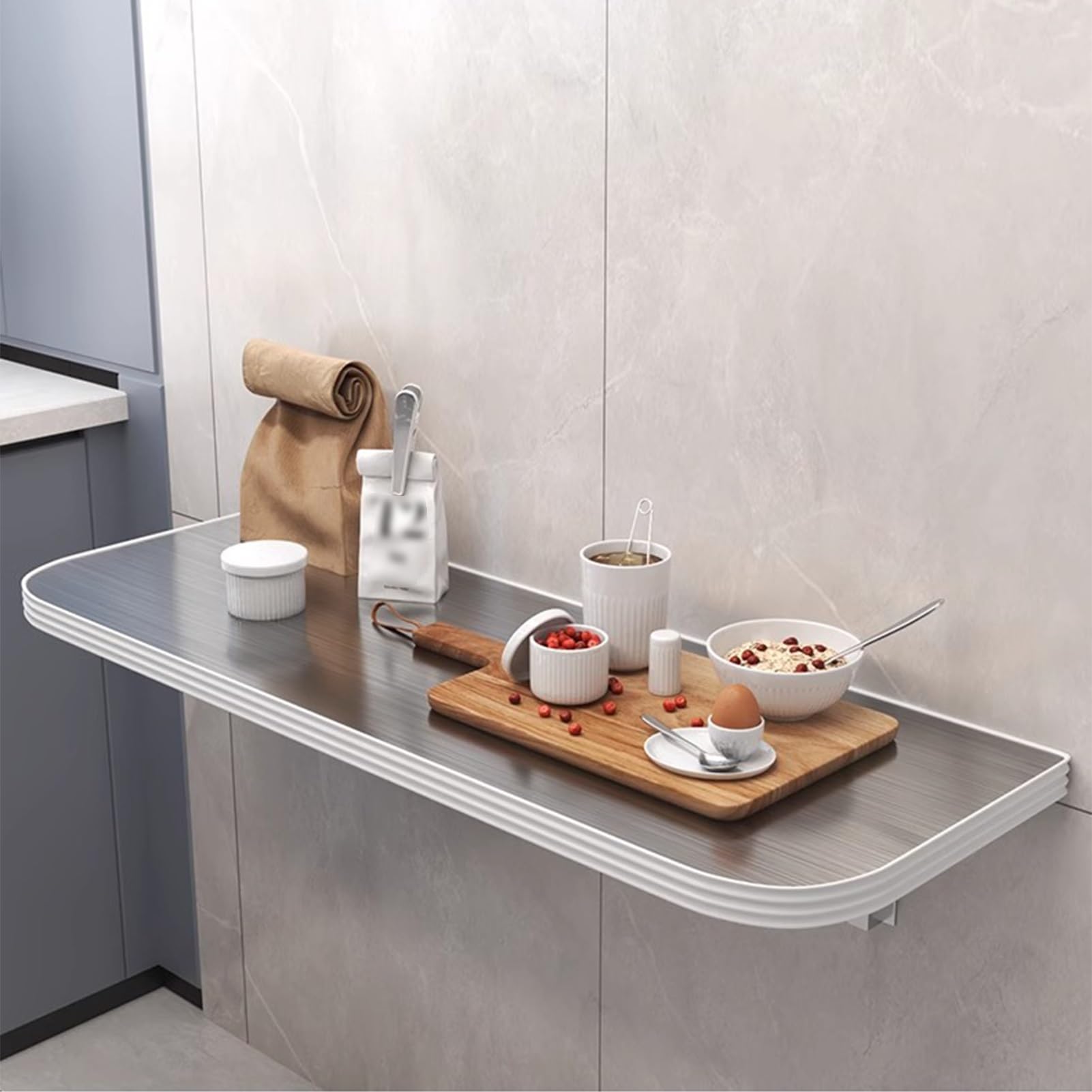 Tables murales pliantes en inox : gagnez de la place dans votre buanderie.
