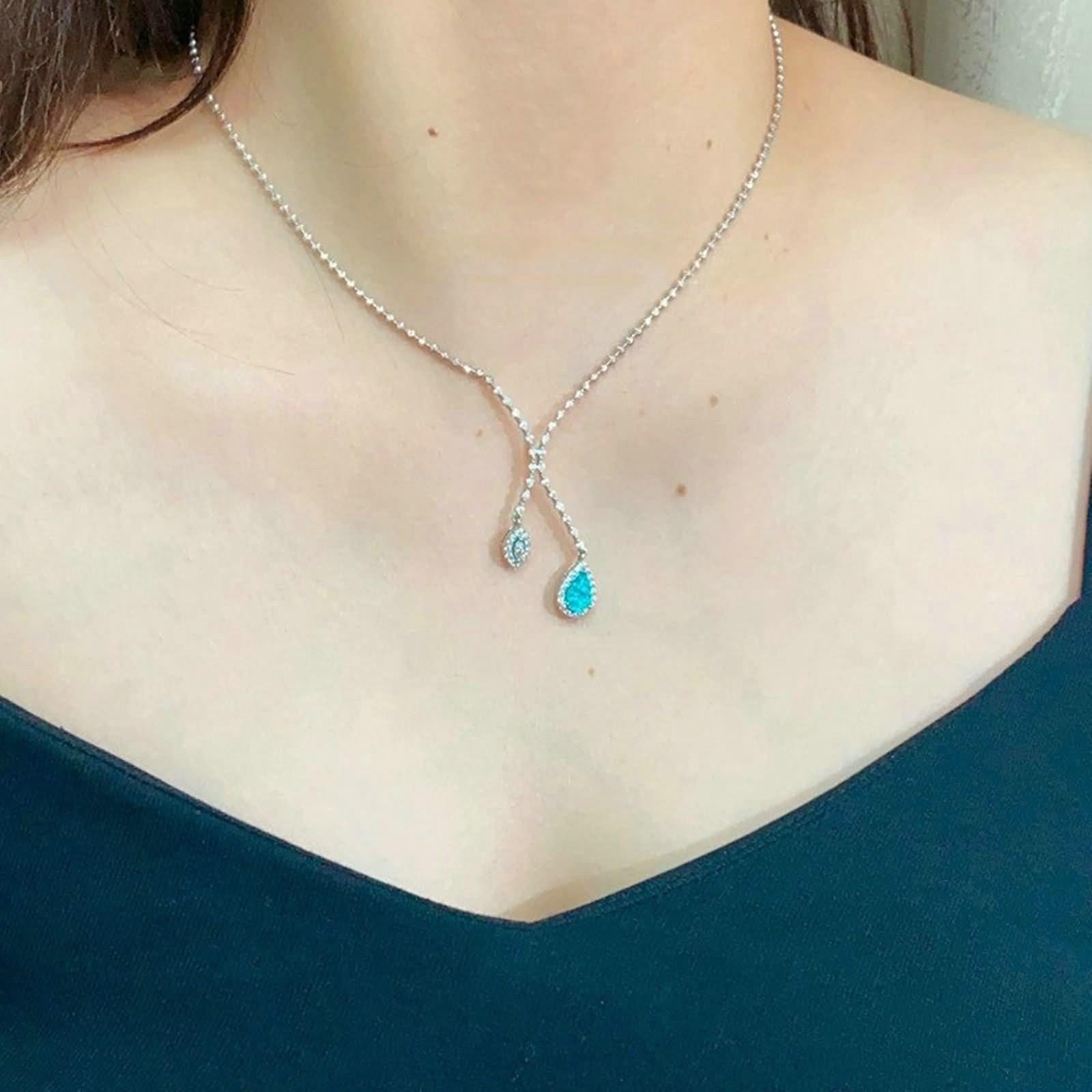 Łańcuszek przyjaźni damski, łańcuszek na szyję z wisiorkiem Infinity z turmalinem Paraiba i moissanit 18-karatowe białe złoto 45 cm