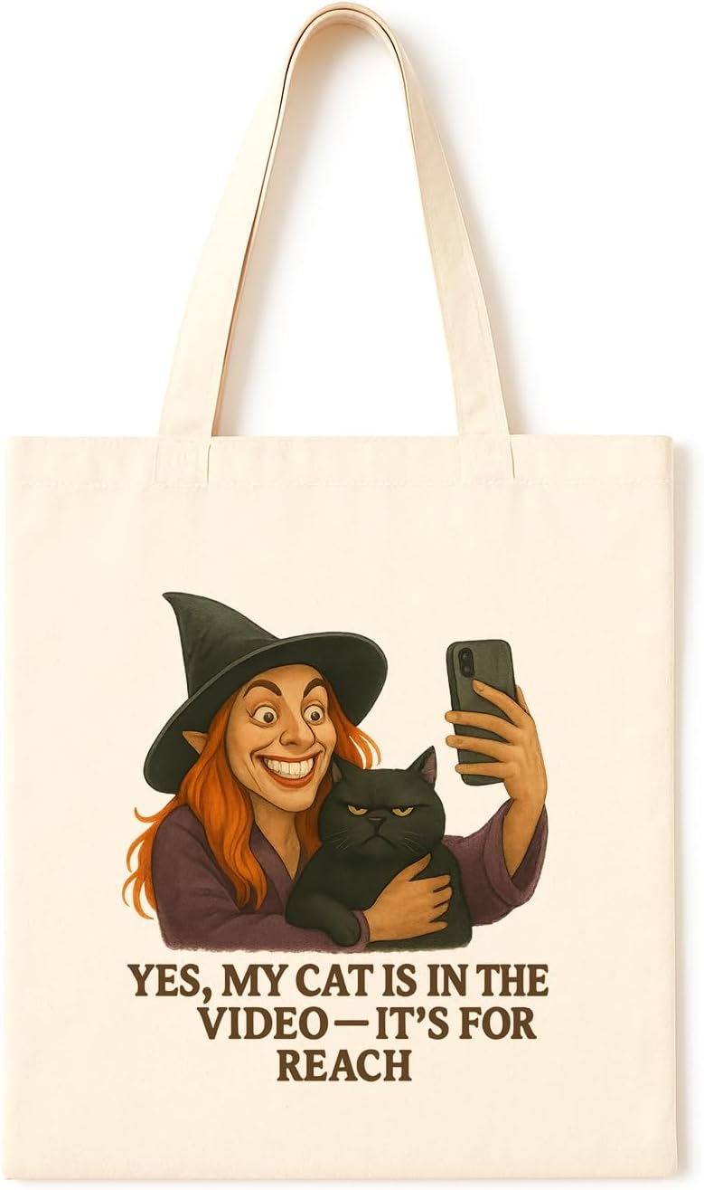 Cat in Video Witch Tote ~ Grinning witch hugging grumpy black cat for views, funny tote for pet-loving content creators