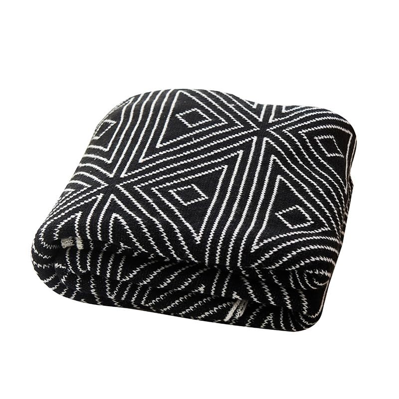Couverture canapé été noir et blanc pour une sieste fraîche et douce