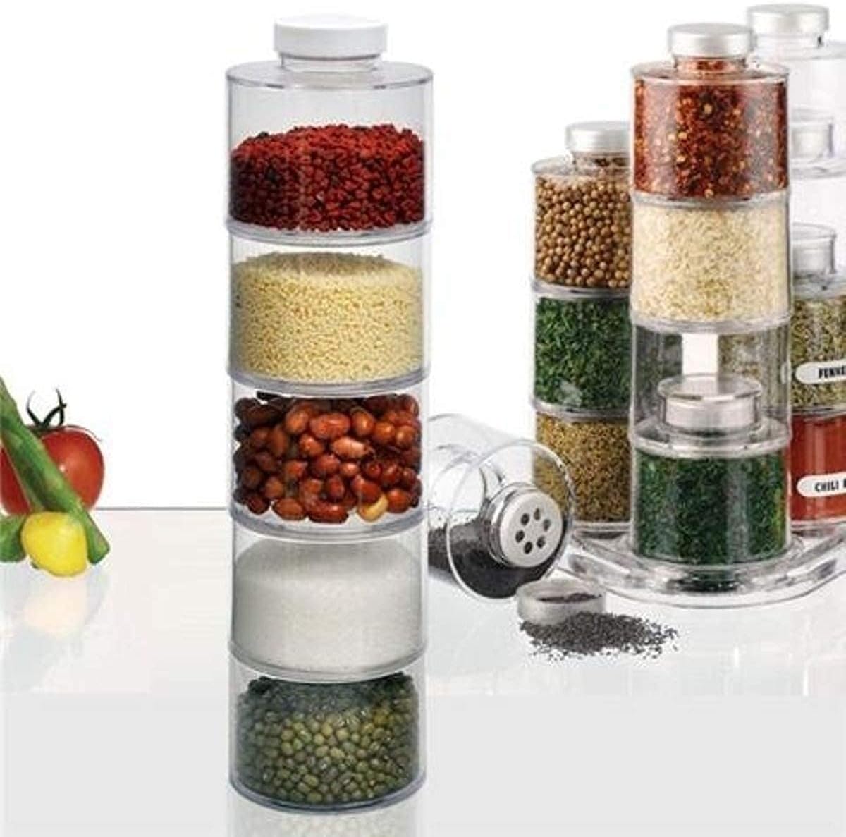 Ritmo 6 self-stacking spice bottles create highly colorful decorative storage space with minimum volume. Great space saving alternative to a spice rack. Spice Tower Carousel