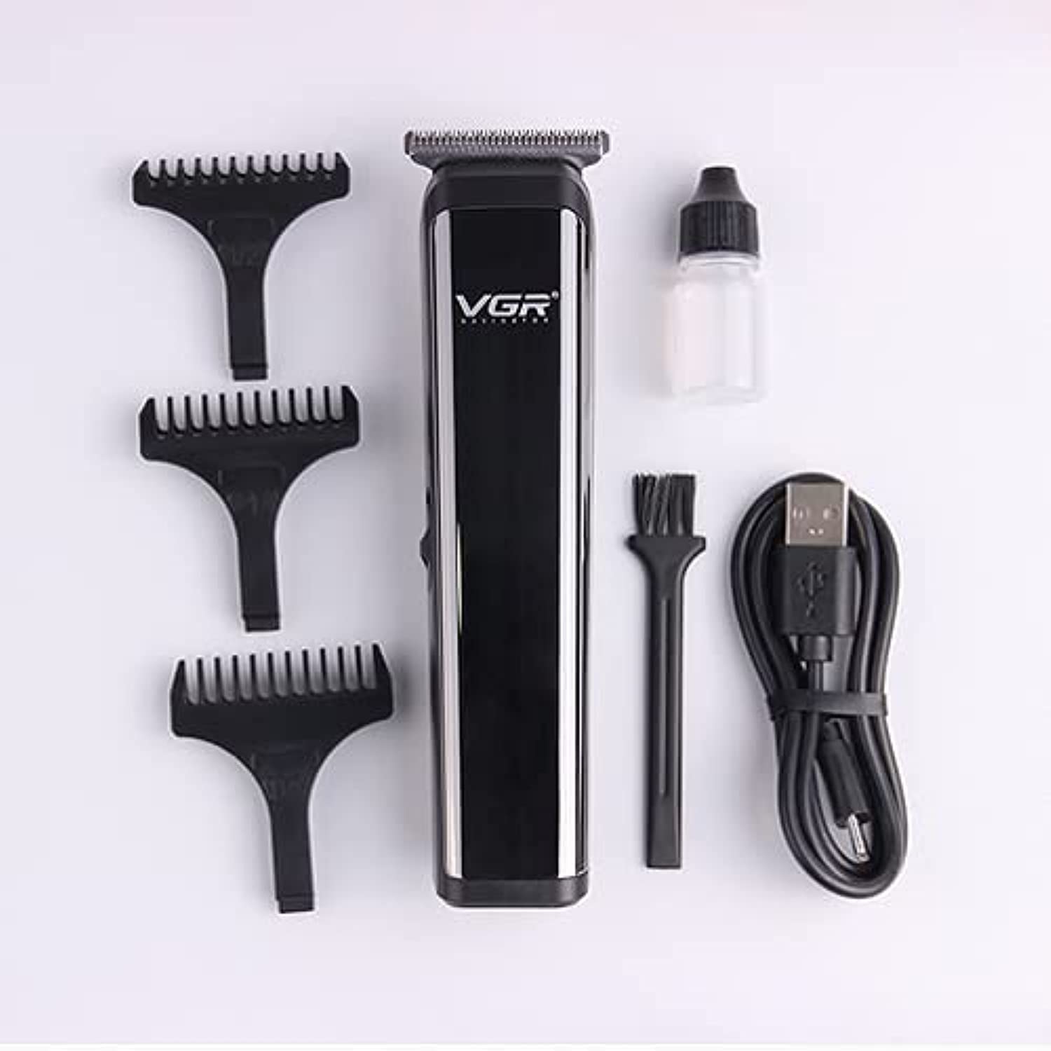 VGR V-180 Trimmer in use, showing the blade and power switch