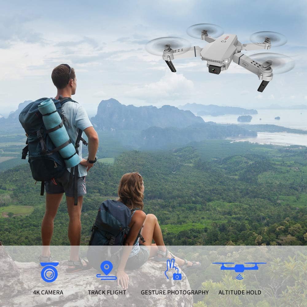 GoolRC LS-E525 RC Drone flying over a scenic landscape with two people watching, highlighting 4K Camera, Track Flight, Gesture Photography, and Altitude Hold features.