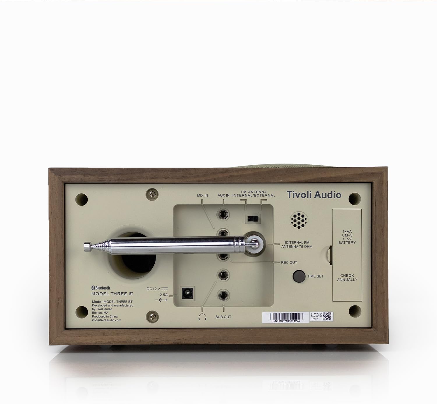 Back panel of Tivoli Audio Model Three showing battery compartment and ports