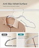 Vista 41 de SONGMICS UCRF029W05 - Paquete de 50 ganchos de terciopelo antideslizantes para trajes con muescas para el hombro, barra para pantalones, gancho