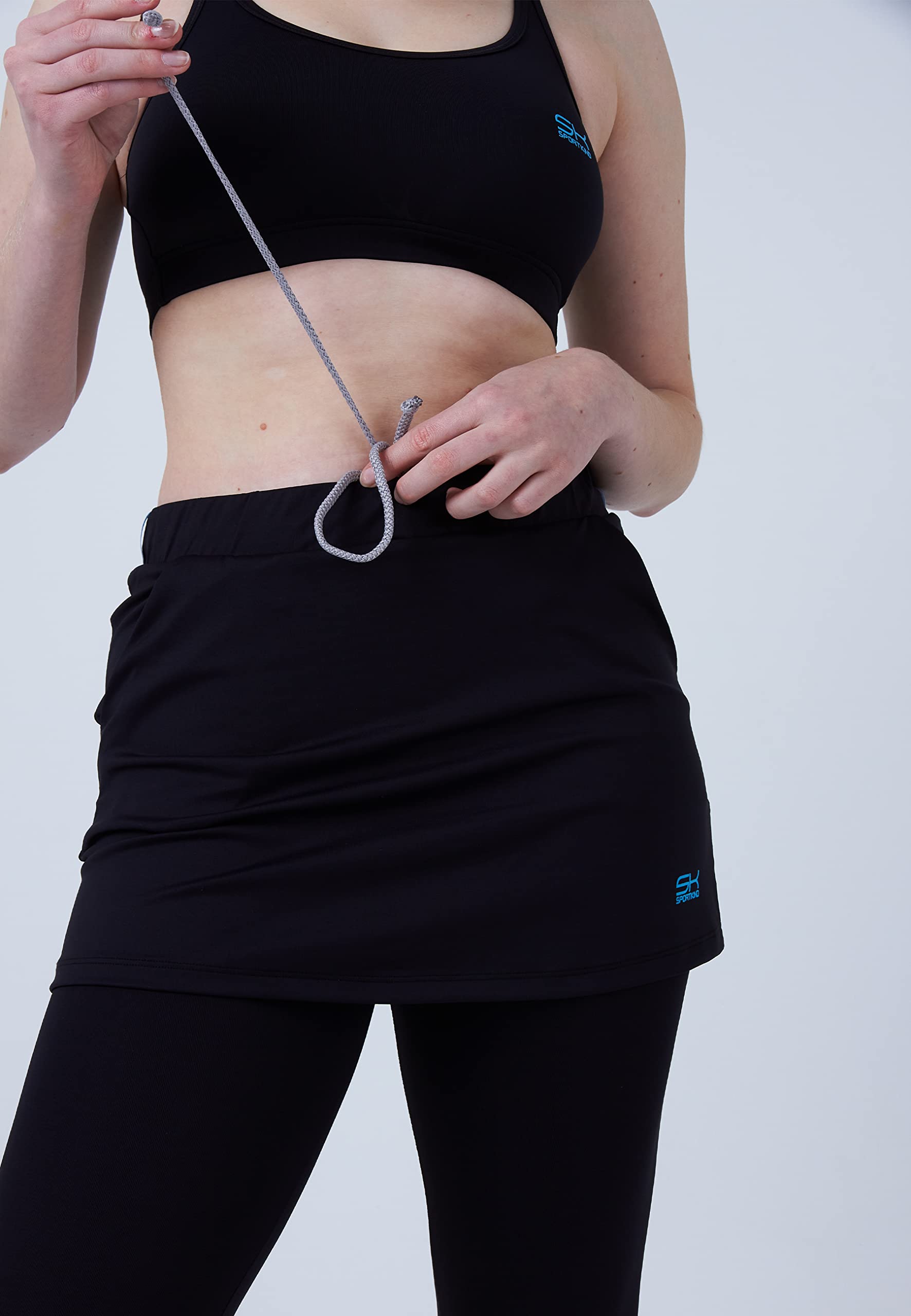 Skapri Sport 2 in 1 per Ragazze e Donne con Tasche, Misura Regolabile, Leggero, Traspirante, Protezione Solare UPF 50+