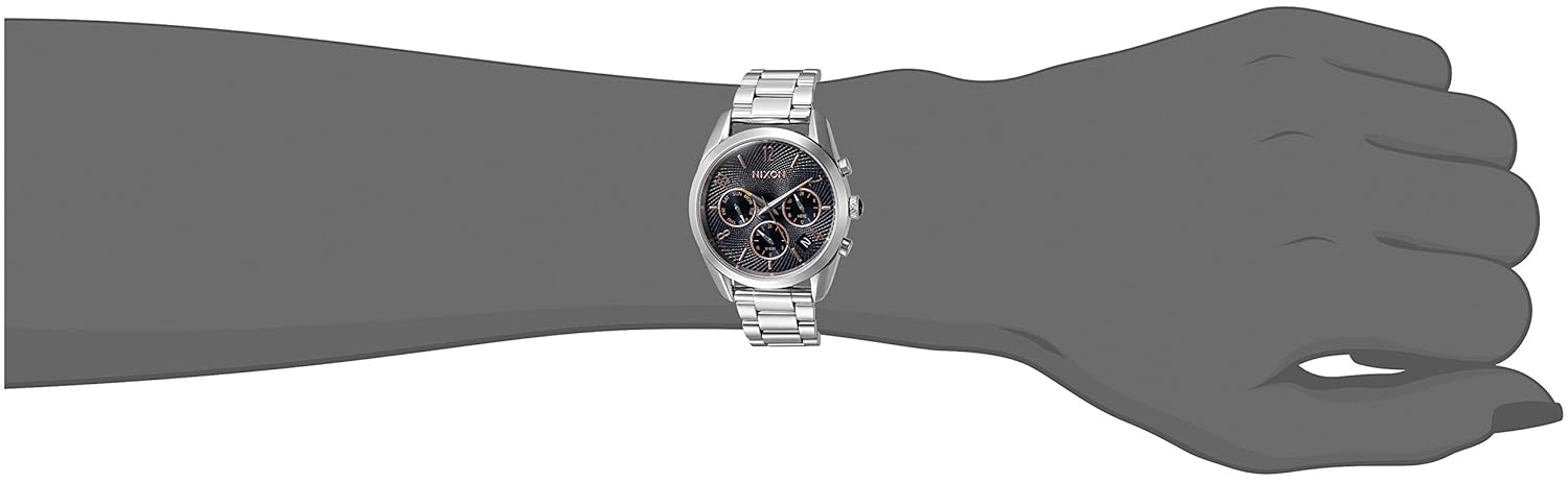 Nixon Bullet Chrono 36 watch on a wrist, showing the fit of the silver stainless steel band