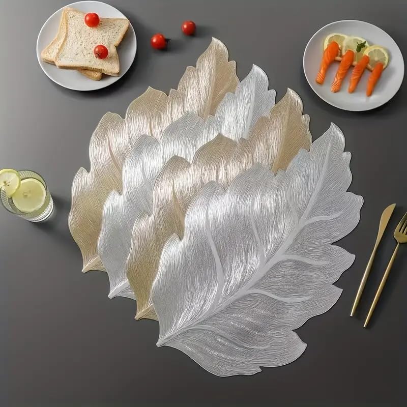 Image of Dakshya Industries Set of 2 PVC Waterproof Leaf Design Table Placemats | Premium Gold Finish Dining Table Mats | Heat Resistant, Washable & Anti-Slip | Decorative Kitchen & Dining Mats (Silver)