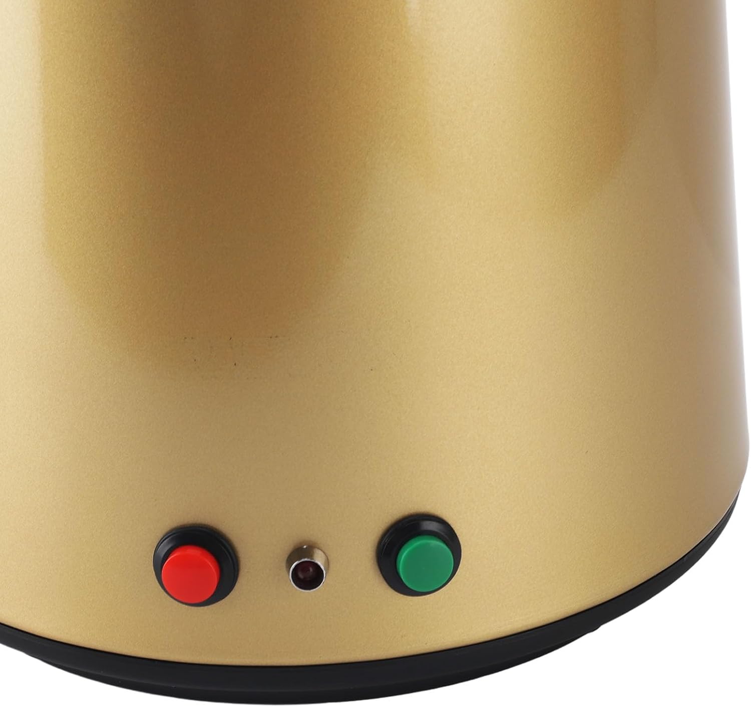 Close-up of the control panel with red stop button and green start button.