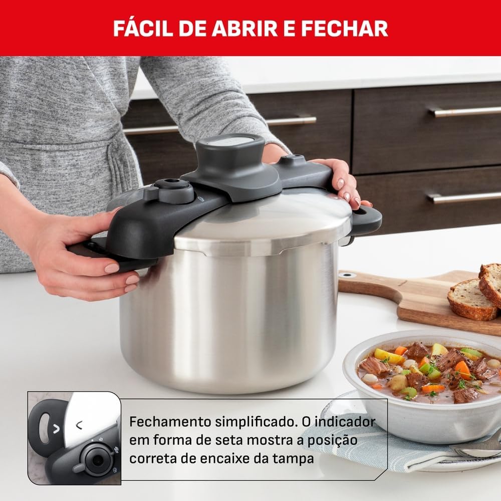 Person closing the lid of the Tefal OptiSpace Pressure Cooker