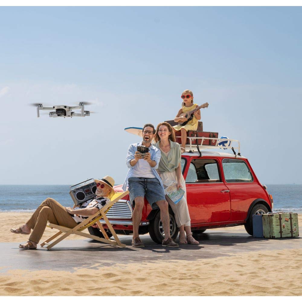DJI Mini 2, Ultraleichte faltbare Kameradrohne, 3-Achsen-Gimbal mit 4K Kamera, 12 MP, 31 min Flugzeit, OcuSync 2.0 10 km HD-Videoübertragung, QuickShots, Drohne für Einsteiger, Grau