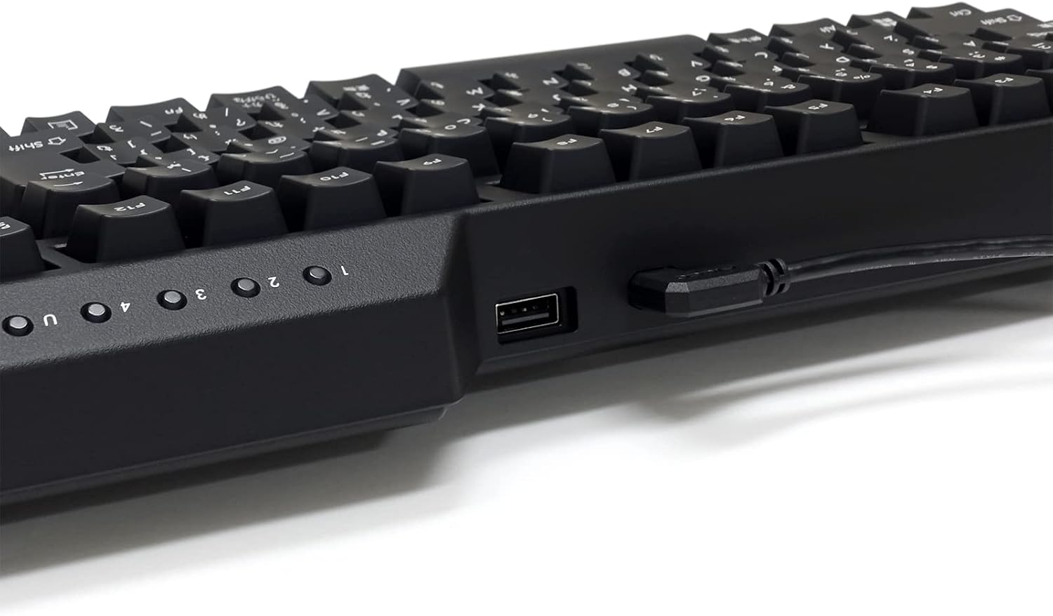 Side view of the keyboard showing the USB-C port and USB-A passthrough port