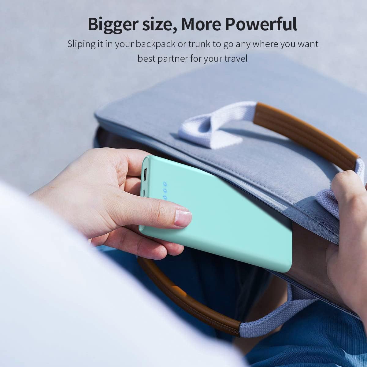 LanLuk Power Bank being placed into a backpack, demonstrating its portability and ease of carrying for travel.