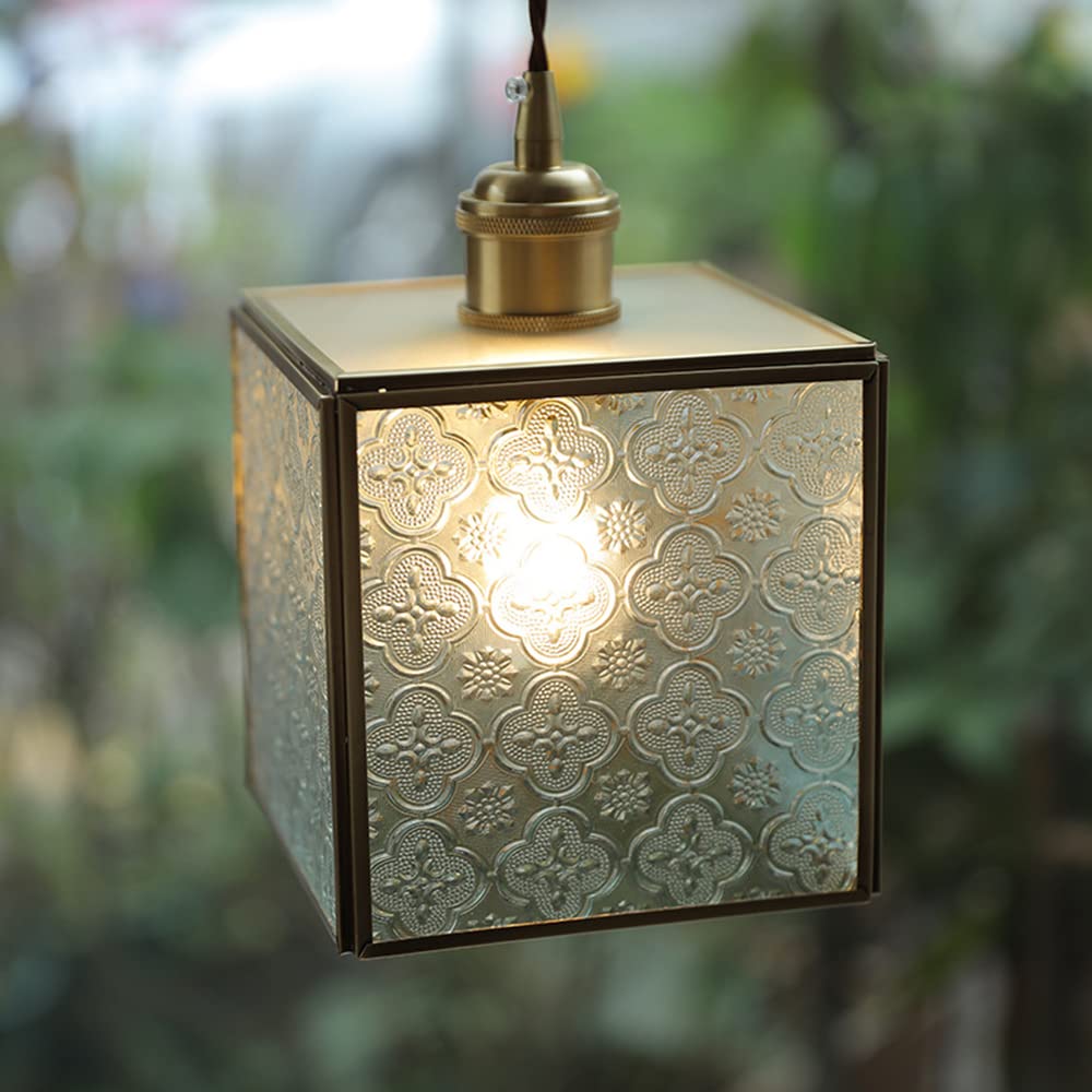 Petit lustre E27 en verre pour remplacer un éclairage de salon trop agressif
