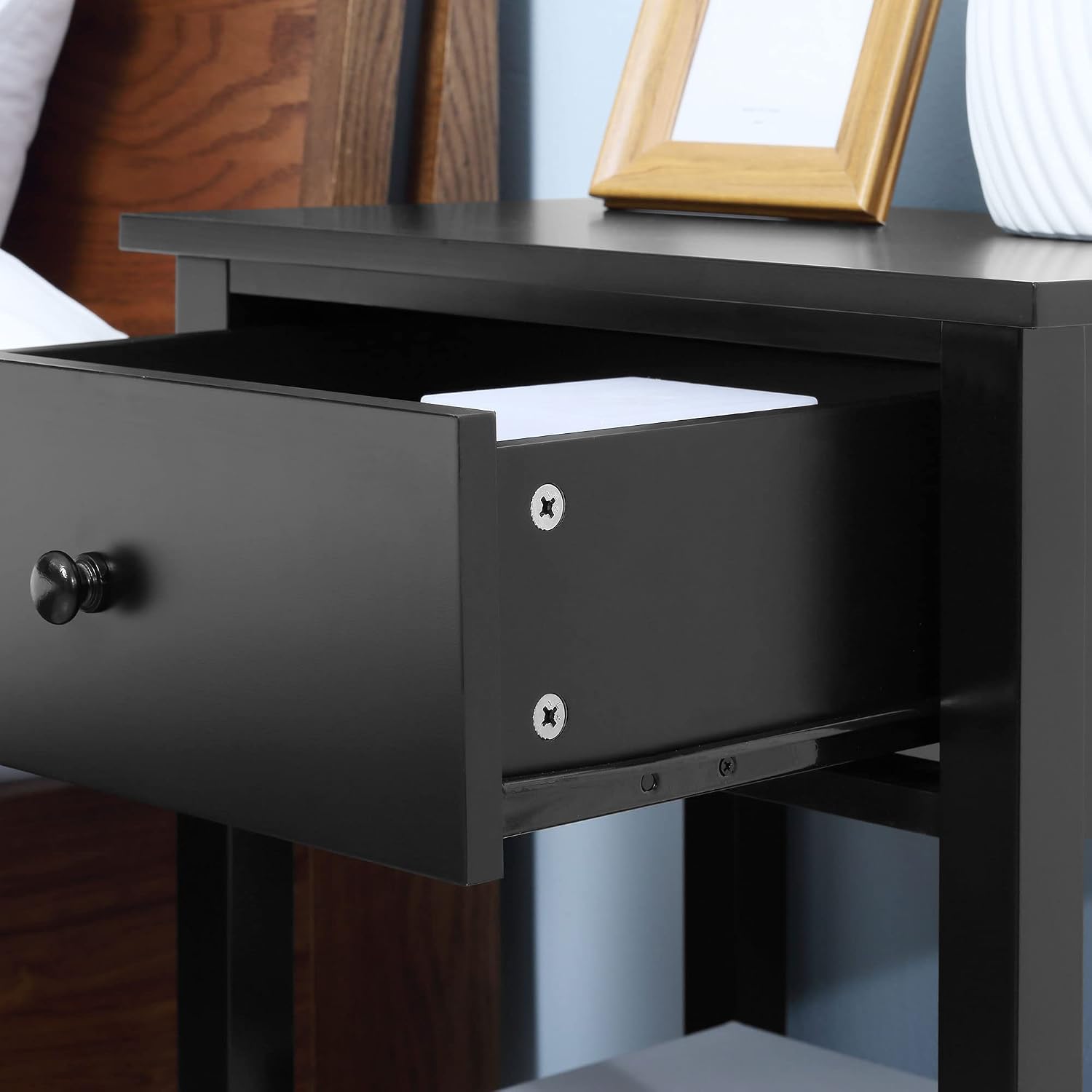 The drawer of the HOMCOM Modern Nightstand pulled open, revealing its interior storage space.