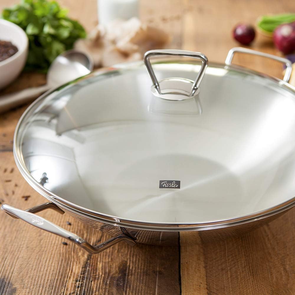 Fissler Kunming Padella wok in acciaio inox 36 cm, grande padella wok senza rivestimento, padella di ispirazione asiatica con coperchio in vetro, incluso inserto vaporiera, anche a induzione