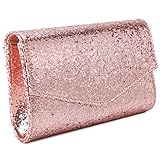 Mit ausgefallenen glitzernden Pailletten und Materialmix und beiliegender Schulterkette