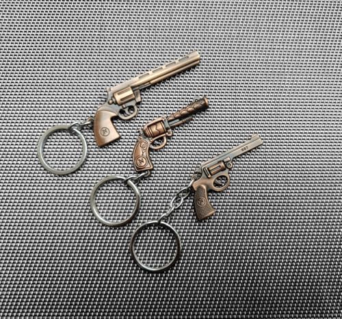 Image of Combo Of Gun Shape Antique Metal Keychain for Cars and Bikes (Pack Of 3) (Bronze)