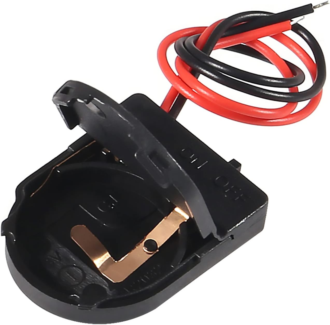 Open CR2032 battery holder showing the internal contacts and empty compartment