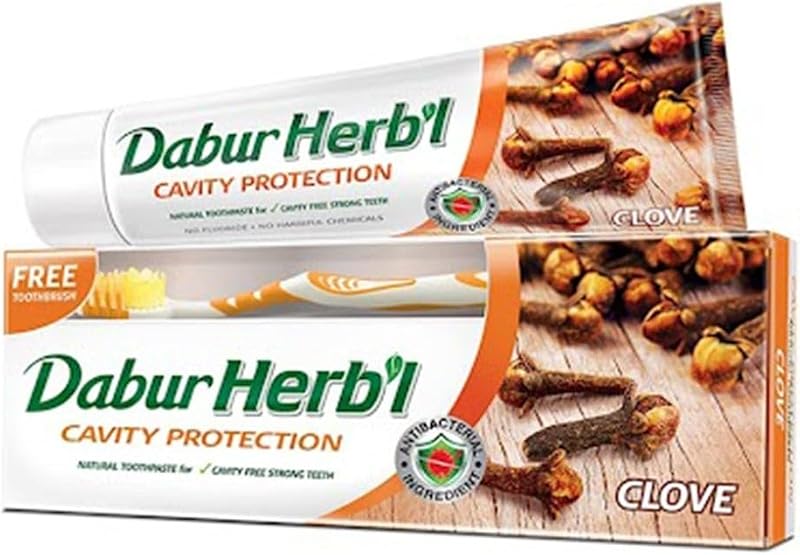 Dabur Herbal Cavity Protection Clove Toothpaste (140g) with Toothbrush | Enriched with Clove | Natural Toothpaste For Cavity Free Strong Teeth