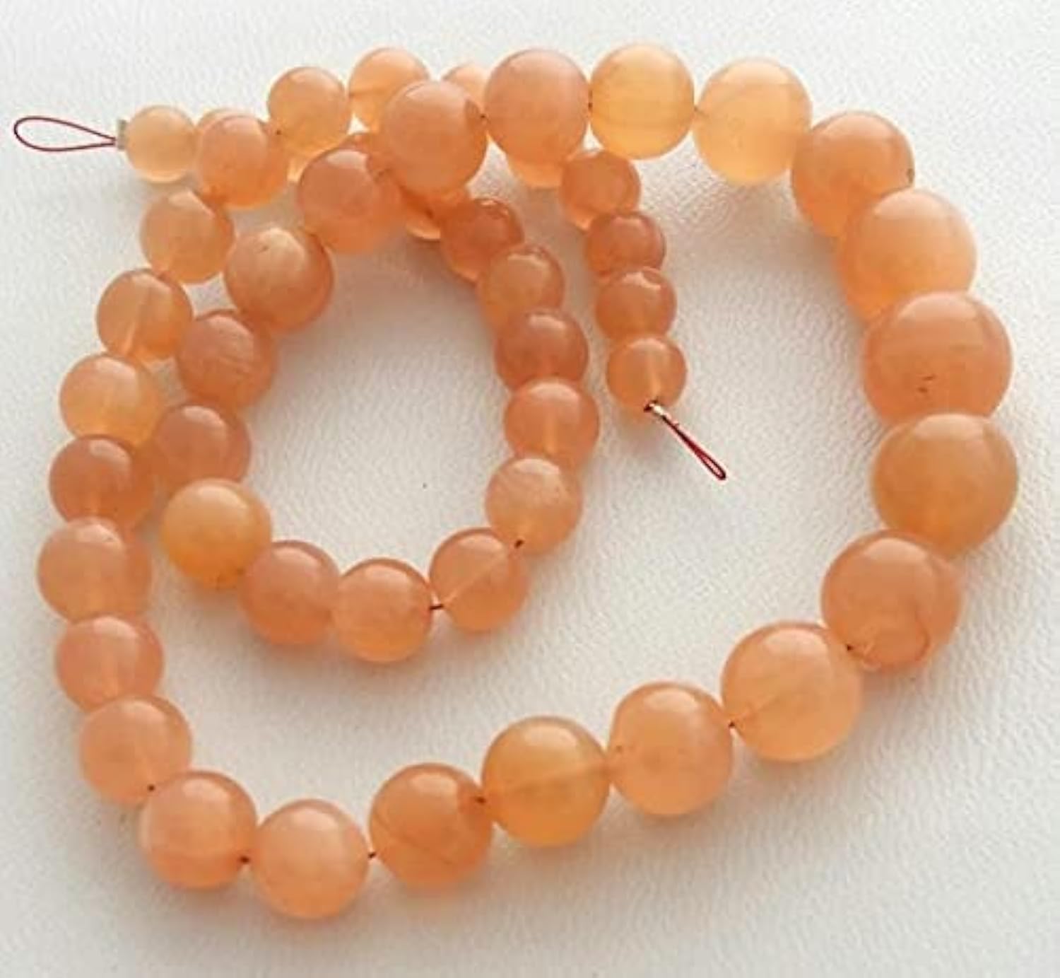 Pierre de lune pêche naturelle LKBEADS pour créer vos bijoux d'été