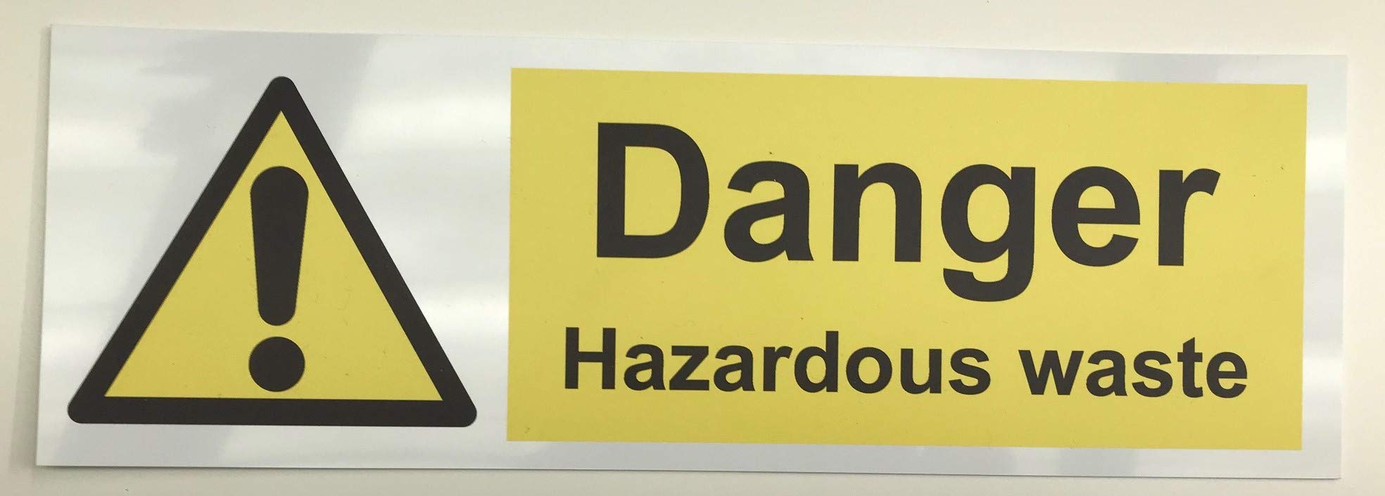 Danger hazardous waste Safety sign - Self adhesive sticker 150mm x 50mm