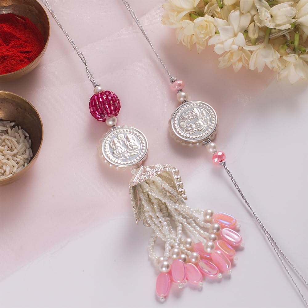 CONFETTI GIFTS Boys Rakhi Gift Combo For Brother Bhaiya And Bhabhi | Set Of 2 Rakhi With Roli-Rice And Greeting Card | Silver Coin Design Pink Couple Rakhi (B0D9HGLBRY) Amazon Price History, Amazon Price Tracker