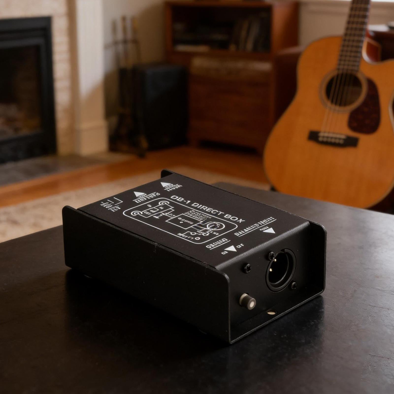 Boîtier DI pour guitare basse avec isolation stéréo passive et sortie XLR pour fournir un signal équilibré stable à un bureau de mixage ou à une interface audio