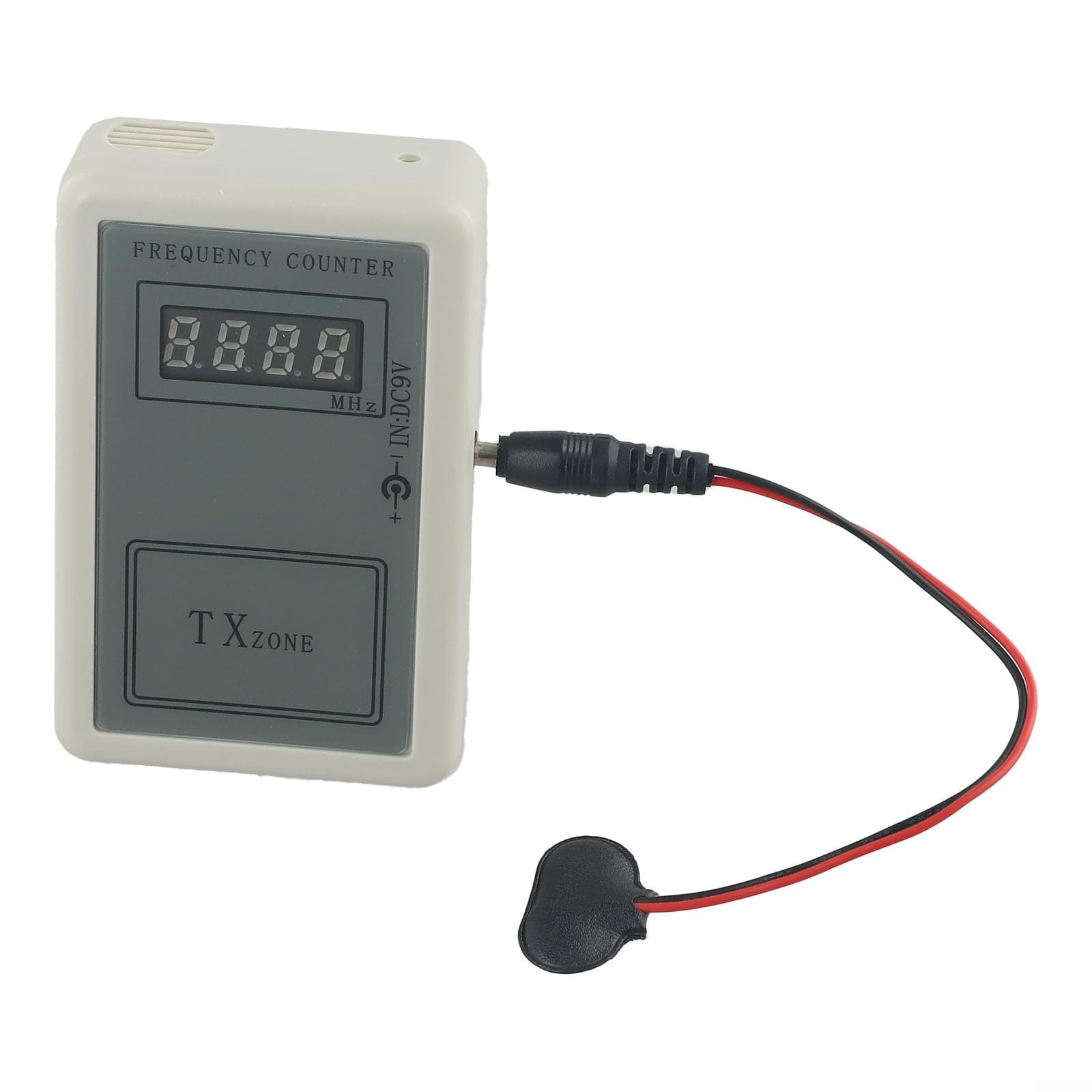 Tester tenuto in mano del contatore di frequenza di rf per i regolatori elettrici della porta ed i antifurto