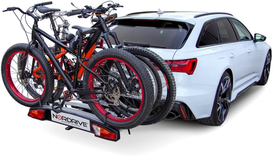 NORDRIVE N50416 Wave 3 bike rack installed on a car with three bicycles