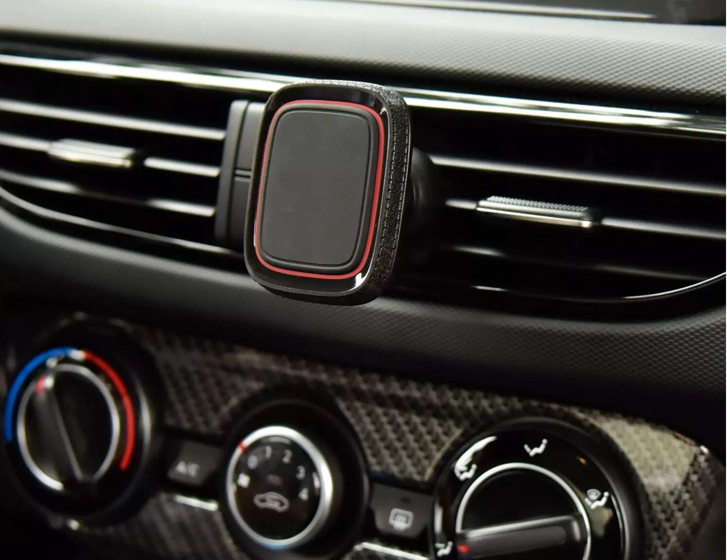 Oli CT213 Car Magnetic Phone Holder installed in a car air vent