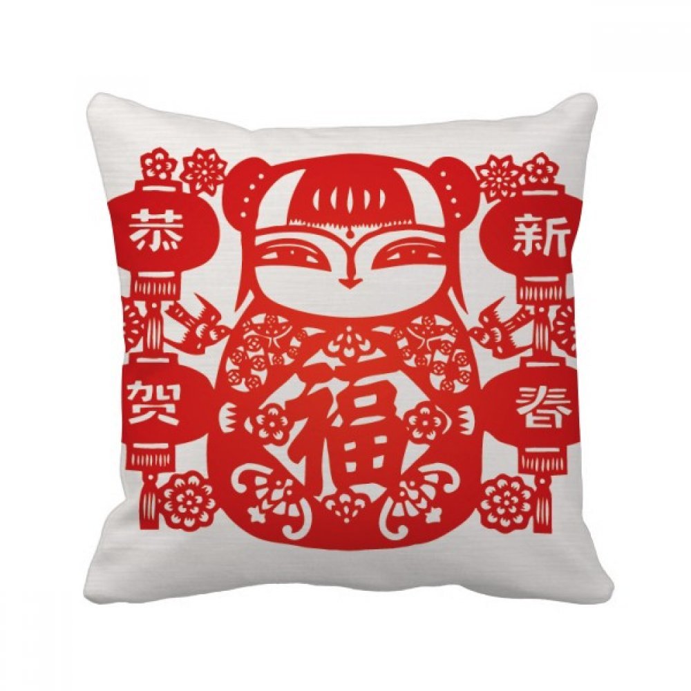 Coussin carré fleurs et lanterne pour raviver un canapé terne et fatigué facilement