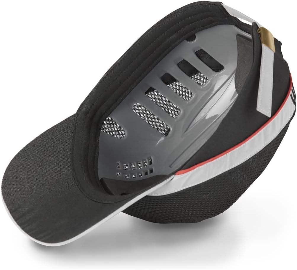 Inside view of the Facom safety cap showing the grey protective shell inserted into the black fabric cap.